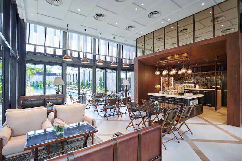 Barracks Hotel cafe with interior dining and poolside views